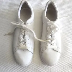 Tory Burch White Leather Sneakers with Low-Top Design some scratch
