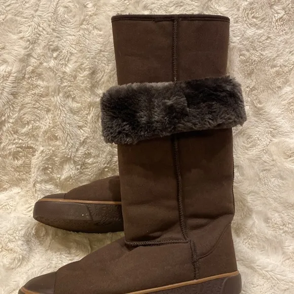UGG new sheepskin brown leather tall pull on boots size 9.