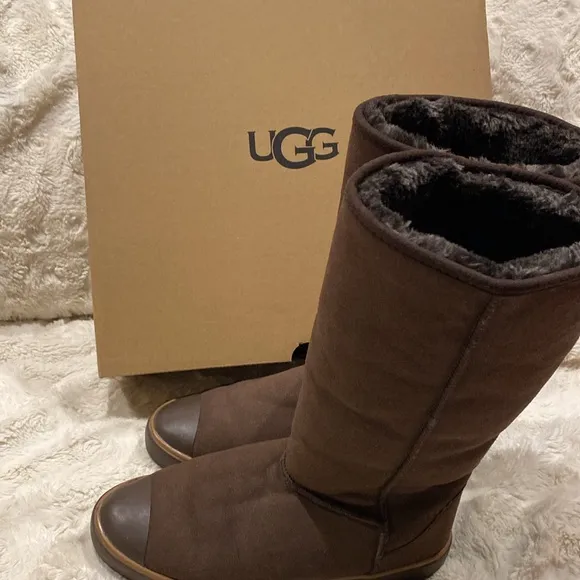 UGG new sheepskin brown leather tall pull on boots size 9.
