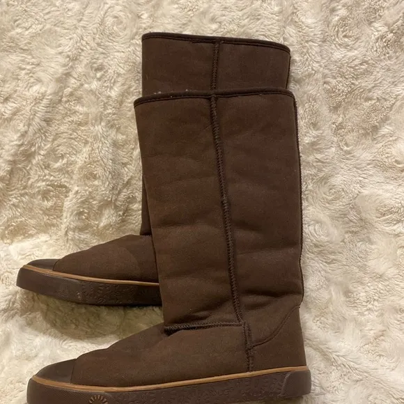 UGG new sheepskin brown leather tall pull on boots size 9.