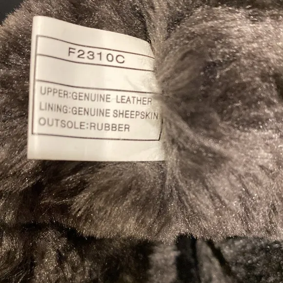 UGG new sheepskin brown leather tall pull on boots size 9.