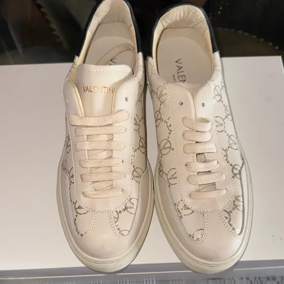 Valentino Cream Sneakers with Minimalist Design and Lace-Up Style