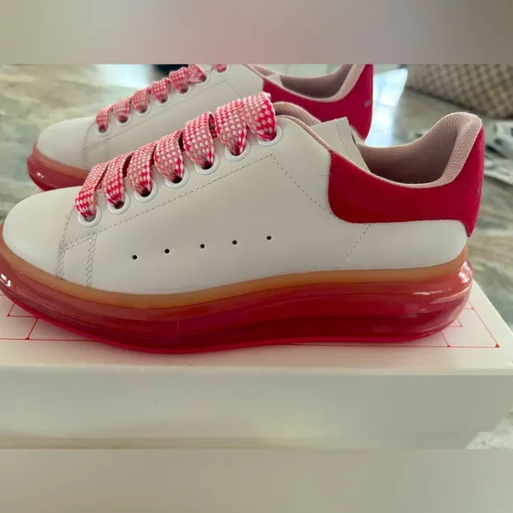 White with Fucsia sole Alexander McQueen Larry Sneakers. Brand new with box.