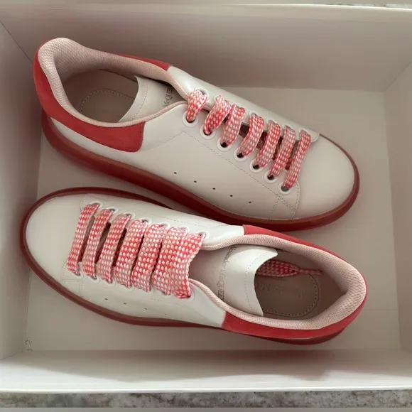 White with Fucsia sole Alexander McQueen Larry Sneakers. Brand new with box.